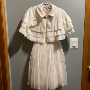 BRAND NEW GIRLS DRESS SIZE 7/8! COLOR IS IVORY. STUNNING IN PERSON. NWT.